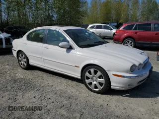 2006 Jaguar X-Type with VIN SAJWA51A06WE68591, listed as a Copart auction lot 53020355 with 179,379 mi miles and Salvage Title. Bid and sale history available at DreamBid. Image 4.