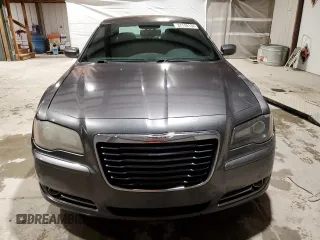 2013 Chrysler 300 with VIN 2C3CCABG3DH621792, listed as a Copart auction lot 37748134 with 202,963 mi miles and Salvage Title. Bid and sale history available at carsss.com. Image 5.