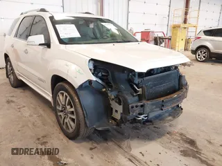 2014 GMC Acadia Denali with VIN 1GKKVTKD1EJ351419, listed as a IAAI auction lot 41728881 with 245,672 mi miles and . Bid and sale history available at carsss.com. Image 18.