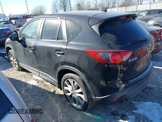 2013 Mazda CX-5 Grand Touring with VIN JM3KE2DE1D0164723, listed as a IAAI auction lot 41364590 with 227,932 mi miles. Bid and sale history available at carsss.com. Image 3.