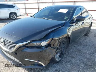 2016 Mazda 6 i Grand Touring with VIN JM1GJ1W50G1478699, listed as a IAAI auction lot 41711211 with 208,720 mi miles and . Bid and sale history available at DreamBid. Image 6.