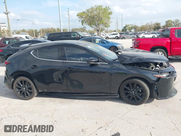 2023 Mazda 3 Premium Plus z VIN JM1BPBNY0P1615814, wystawiony jako IAAI lot #41718577 z przebiegiem Nie podano mil oraz . Historia ofert i sprzedaży dostępna na DreamBid. Obrazek 13.