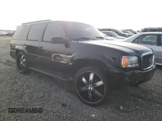 1999 Cadillac Escalade z VIN 1GYEK13R7XR405790, wystawiony jako Copart lot #84478384 z przebiegiem 244 195 mil mil oraz Szkody całkowita. Historia ofert i sprzedaży dostępna na DreamBid. Obrazek 4.