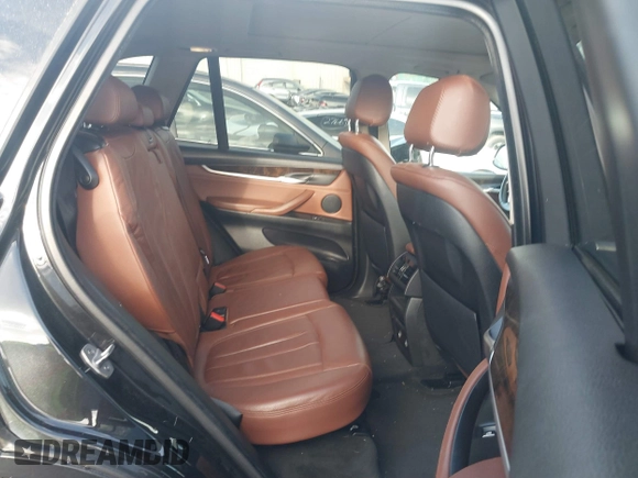 2014 BMW X5 sDrive35i with VIN 5UXKR2C50E0H31926, listed as a IAAI auction lot 41838021 with 125,813 mi miles. Bid and sale history available at carsss.com. Image 8.