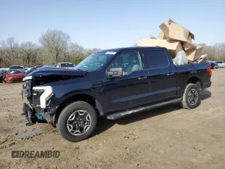 2022 Ford F-150 Lightning Pro z VIN 1FTVW1EL6NWG04931, wystawiony jako Copart lot #43184675 z przebiegiem 26 616 mil mil oraz Szkody całkowita. Historia ofert i sprzedaży dostępna na DreamBid. Obrazek 1.