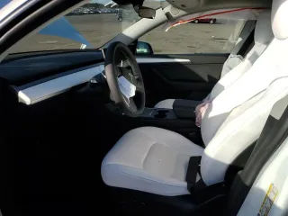 2024 Tesla Model Y Long Range with VIN 7SAYGDEE1RF036260, listed as a Copart auction lot 78805764 with 7,850 mi miles and Non repairable. Bid and sale history available at DreamBid. Image 7.