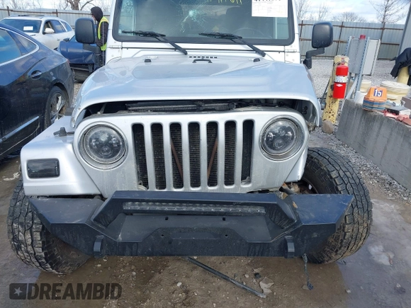 2005 Jeep Wrangler Unlimited with VIN 1J4FA44S25P340852, listed as a IAAI auction lot 41441671 with 139,302 mi miles. Bid and sale history available at carsss.com. Image 6.