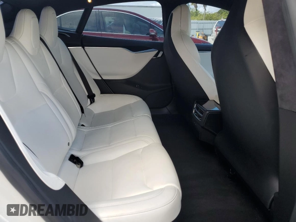 2017 Tesla Model S 100D z VIN 5YJSA1E21HF229936, wystawiony jako Copart lot #54734955 z przebiegiem 125 511 mil mil oraz Szkoda całkowita • Salvage title. Historia ofert i sprzedaży dostępna na DreamBid. Obrazek 11.