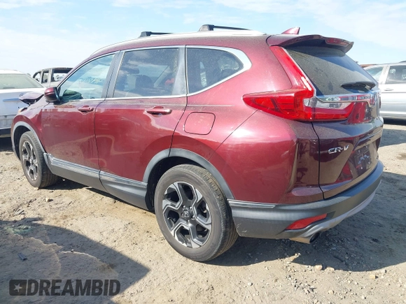 2018 Honda CR-V Touring with VIN 7FARW2H9XJE064414, listed as a IAAI auction lot 41904372 with 88,219 mi miles and . Bid and sale history available at DreamBid. Image 3.