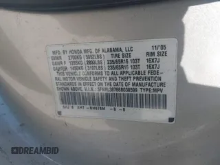 2006 Honda Odyssey EX-L with VIN 5FNRL38766B038599, listed as a IAAI auction lot 41989217 with 164,118 mi miles. Bid and sale history available at carsss.com. Image 9.