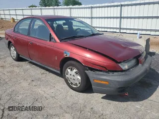 1999 Saturn SL z VIN 1G8ZH5288XZ273509, wystawiony jako Copart lot #55508215 z przebiegiem 168 946 mil mil oraz Szkoda całkowita • Salvage title. Historia ofert i sprzedaży dostępna na DreamBid. Obrazek 4.