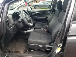2020 Honda Fit LX z VIN 3HGGK5H40LM702884, wystawiony jako Copart lot #66718212 z przebiegiem 8 120 mil mil oraz . Historia ofert i sprzedaży dostępna na DreamBid. Obrazek 7.