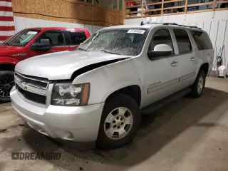 2013 Chevrolet Suburban LS with VIN 1GNSKHE72DR263672, listed as a Copart auction lot 87855905 with 124,081 mi miles and Salvage Title. Bid and sale history available at carsss.com. Image 1.