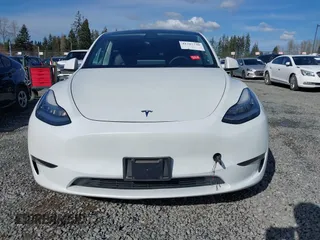 2021 Tesla Model Y Standard Range with VIN 5YJYGDED9MF110697, listed as a IAAI auction lot 41707730 with Not Provided miles and . Bid and sale history available at carsss.com. Image 12.