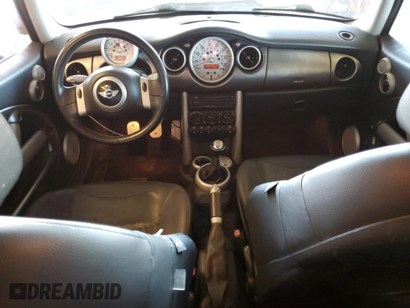 2003 MINI Hardtop S with VIN WMWRE33423TD59829, listed as a Copart auction lot 51691785 with 124,612 mi miles and Salvage Title. Bid and sale history available at DreamBid. Image 8.