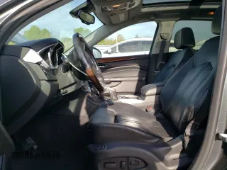 2012 Cadillac SRX Performance Collection z VIN 3GYFNBE3XCS611543, wystawiony jako Copart lot #56628975 z przebiegiem 61 825 mil mil oraz Szkoda całkowita • Salvage title. Historia ofert i sprzedaży dostępna na DreamBid. Obrazek 7.