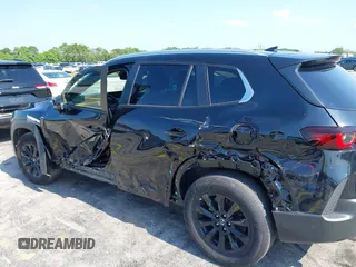 2025 Mazda CX-50 S Premium z VIN 7MMVABDM6SN348791, wystawiony jako IAAI lot #42340944 z przebiegiem 6202 mil mil oraz . Historia ofert i sprzedaży dostępna na DreamBid. Obrazek 19.