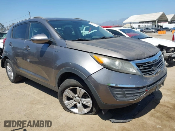 2011 Kia Sportage LX with VIN KNDPBCA20B7170217, listed as a IAAI auction lot 42303069 with 186,994 mi miles and . Bid and sale history available at DreamBid. Image 1.