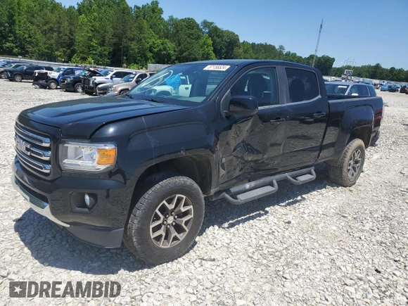 2015 GMC Canyon 4WD SLE with VIN 1GTG6BE32F1115990, listed as a Copart auction lot 71295314 with 118,913 mi miles and Salvage Title. Bid and sale history available at carsss.com. Image 1.