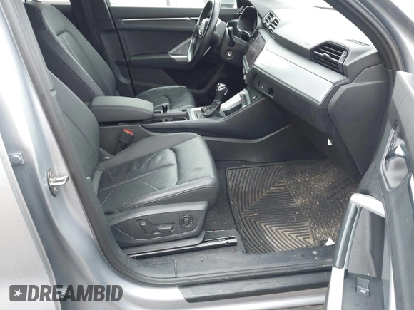 2021 Audi Q3 Premium with VIN WA1AUCF35M1131933, listed as a IAAI auction lot 41710739 with 93,293 mi miles and . Bid and sale history available at DreamBid. Image 5.
