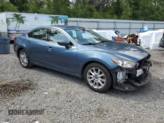 2015 Mazda 6 i Sport with VIN JM1GJ1U62F1176499, listed as a Copart auction lot 55613035 with 114,009 mi miles and Salvage Title. Bid and sale history available at DreamBid. Image 4.