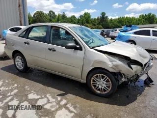 2006 Ford Focus S z VIN 1FAFP34N46W154378, wystawiony jako Copart lot #58422605 z przebiegiem Nie podano mil oraz Szkoda całkowita • Salvage title. Historia ofert i sprzedaży dostępna na DreamBid. Obrazek 4.