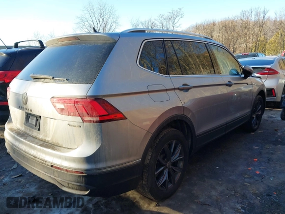 2023 Volkswagen Tiguan SE with VIN 3VVMB7AX7PM017807, listed as a IAAI auction lot 41422055 with 23,974 mi miles and . Bid and sale history available at DreamBid. Image 4.