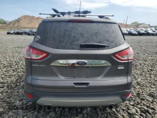 2013 Ford Escape SEL z VIN 1FMCU9HX6DUB05689, wystawiony jako Copart lot #55148765 z przebiegiem 69 178 mil mil oraz Czysty tytuł • Clean title. Historia ofert i sprzedaży dostępna na DreamBid. Obrazek 6.