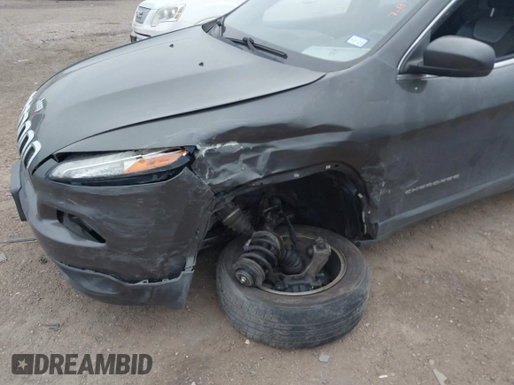 2014 Jeep Cherokee Limited with VIN 1C4PJLDS9EW301718, listed as a IAAI auction lot 41615778 with 114,022 mi miles and . Bid and sale history available at DreamBid. Image 6.