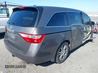 2011 Honda Odyssey EX-L with VIN 5FNRL5H68BB083492, listed as a IAAI auction lot 42087699 with 155,141 mi miles and . Bid and sale history available at carsss.com. Image 4.