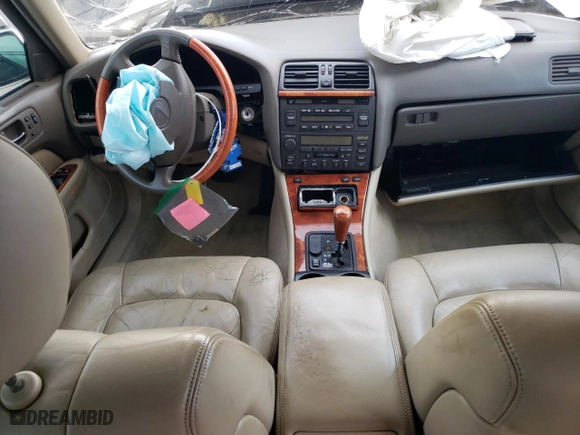 1999 Lexus LS 400 Luxury Sdn with VIN JT8BH28F5X0147574, listed as a Copart auction lot 84227414 with 0 mi miles and Salvage Title. Bid and sale history available at carsss.com. Image 8.