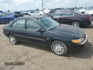 1998 Ford Escort SE with VIN 1FAFP13P9WW174004, listed as a Copart auction lot 65843664 with 101,507 mi miles and Clean Title. Bid and sale history available at carsss.com. Image 4.