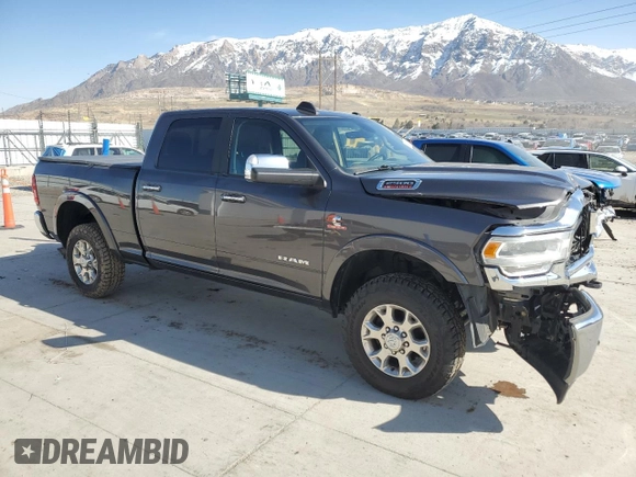 2020 Ram 2500 Laramie with VIN 3C6UR5FL6LG122309, listed as a Copart auction lot 48019295 with 57,352 mi miles and Salvage Title. Bid and sale history available at carsss.com. Image 4.