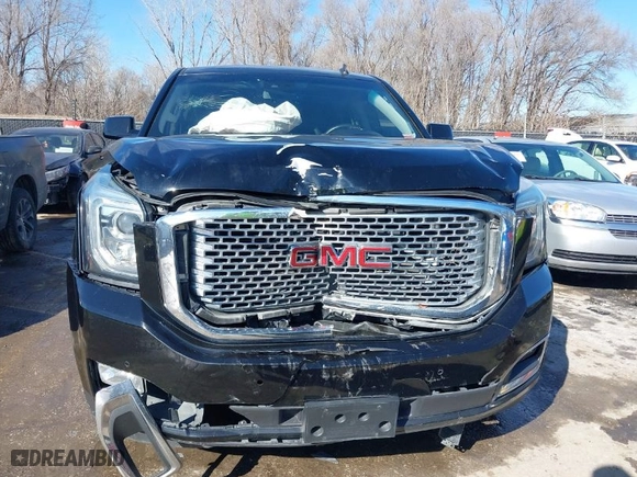 2015 GMC Yukon Denali with VIN 1GKS2CKJXFR227053, listed as a IAAI auction lot 41648799 with 190,092 mi miles. Bid and sale history available at carsss.com. Image 6.