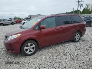 2015 Toyota Sienna LE AAS with VIN 5TDKK3DC7FS570673, listed as a Copart auction lot 57026935 with 143,969 mi miles and Clean title. Bid and sale history available at DreamBid. Image 1.