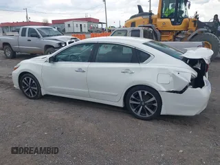 2017 Nissan Altima SR with VIN 1N4AL3APXHC152604, listed as a IAAI auction lot 41978787 with 104,268 mi miles and . Bid and sale history available at DreamBid. Image 14.