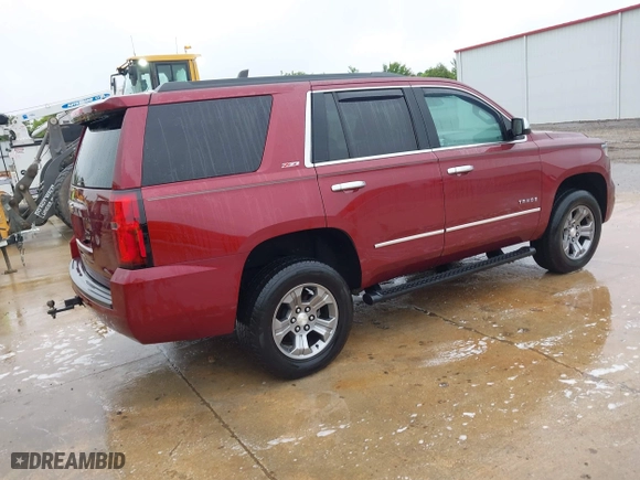 2017 Chevrolet Tahoe LT with VIN 1GNSKBKCXHR270034, listed as a IAAI auction lot 42036132 with 144,530 mi miles. Bid and sale history available at carsss.com. Image 4.