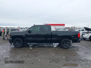 2015 Chevrolet Silverado 1500 LS with VIN 1GCRCPEH5FZ410299, listed as a IAAI auction lot 41106429 with 154,124 mi miles and . Bid and sale history available at DreamBid. Image 14.