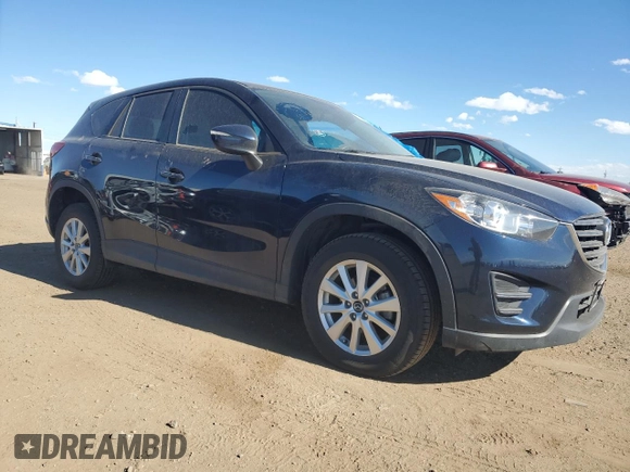 2016 Mazda CX-5 Sport with VIN JM3KE4BY4G0734582, listed as a Copart auction lot 55908515 with 52,323 mi miles and Salvage title. Bid and sale history available at DreamBid. Image 4.