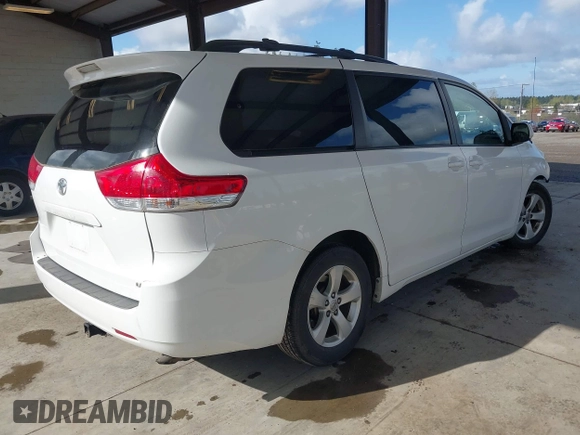 2014 Toyota Sienna LE AAS with VIN 5TDKK3DC4ES505293, listed as a IAAI auction lot 42021409 with 70,319 mi miles. Bid and sale history available at carsss.com. Image 4.