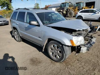 2009 Jeep Grand Cherokee Laredo with VIN 1J8HR48P39C559192, listed as a Copart auction lot 74007094 with 105,997 mi miles and Salvage Title. Bid and sale history available at carsss.com. Image 4.