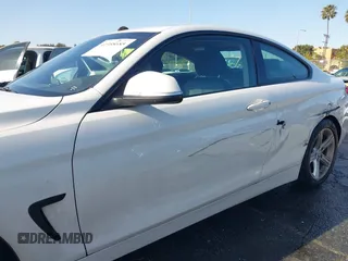 2015 BMW 4 Series 428i with VIN WBA3N7C54FK225367, listed as a IAAI auction lot 41958685 with 142,104 mi miles. Bid and sale history available at carsss.com. Image 6.