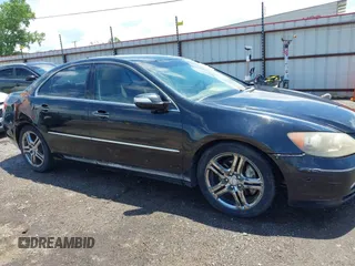 2005 Acura RL z VIN JH4KB16505C001925, wystawiony jako IAAI lot #42435200 z przebiegiem 154 217 mil mil oraz . Historia ofert i sprzedaży dostępna na DreamBid. Obrazek 13.