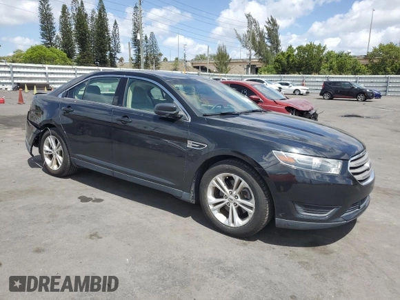 2015 Ford Taurus SE with VIN 1FAHP2D86FG140750, listed as a Copart auction lot 54390145 with 128,163 mi miles and Salvage Title. Bid and sale history available at carsss.com. Image 4.