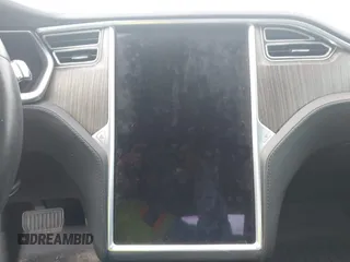 2013 Tesla Model S с VIN 5YJSA1CN4DFP26552, выставлен на аукционе IAAI как лот 42370183 с пробегом Не указан миль и . История ставок и продаж доступна на DreamBid. Изображение 14.