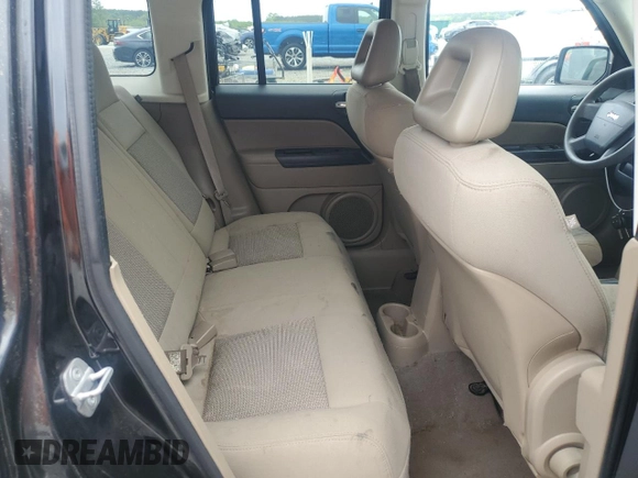 2009 Jeep Patriot Sport z VIN 1J4FT28B39D147223, wystawiony jako Copart lot #53913695 z przebiegiem 132 432 mil mil oraz Szkoda całkowita • Salvage title. Historia ofert i sprzedaży dostępna na DreamBid. Obrazek 11.