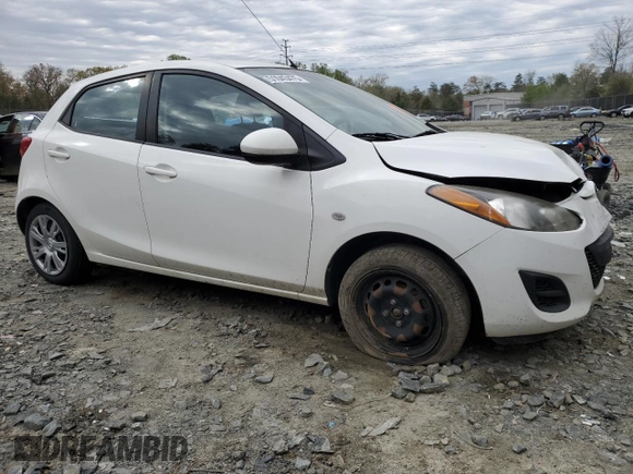 2014 Mazda 2 Sport with VIN JM1DE1KY3E0181629, listed as a Copart auction lot 51043475 with 107,849 mi miles and Salvage Title. Bid and sale history available at carsss.com. Image 4.