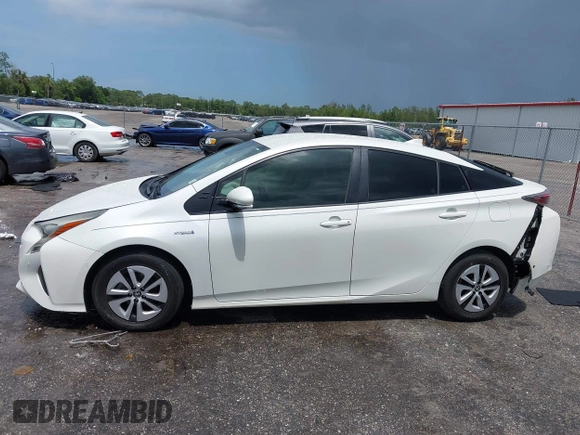 2017 Toyota Prius Two with VIN JTDKBRFU5H3044068, listed as a IAAI auction lot 42462917 with 116,261 mi miles and . Bid and sale history available at DreamBid. Image 14.