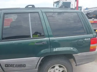 1998 Jeep Grand Cherokee Laredo with VIN 1J4GZ58S7WC284106, listed as a IAAI auction lot 42558498 with 316,354 mi miles and . Bid and sale history available at DreamBid. Image 6.
