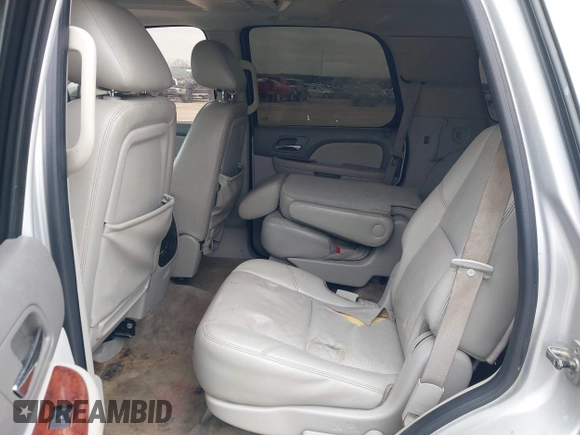 2011 Chevrolet Tahoe LTZ z VIN 1GNSCCE06BR110406, wystawiony jako IAAI lot #41611756 z przebiegiem 162 215 mil mil oraz . Historia ofert i sprzedaży dostępna na DreamBid. Obrazek 19.